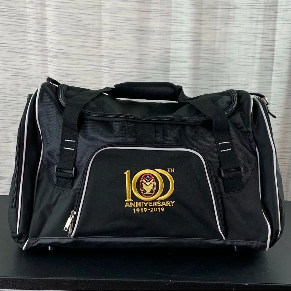 A Black 100th Anniversary Duffel Bag (Masonic?).